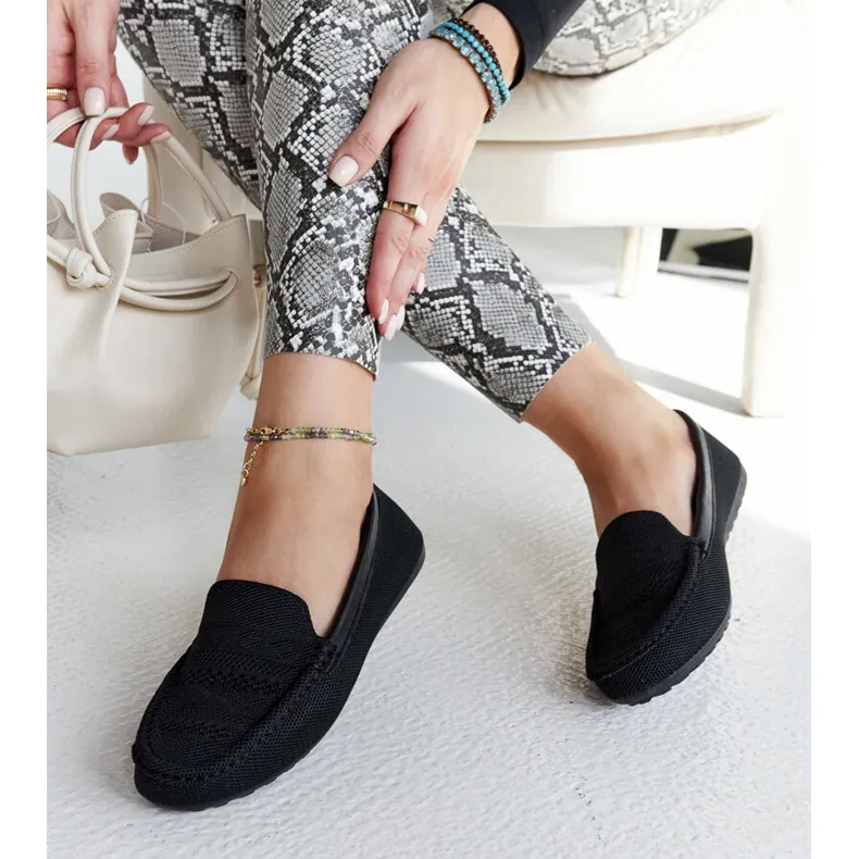 Black fabric moccasins by Fiammetta